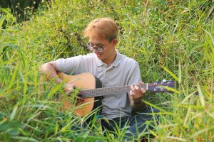 Photo acoustic guitar teacher